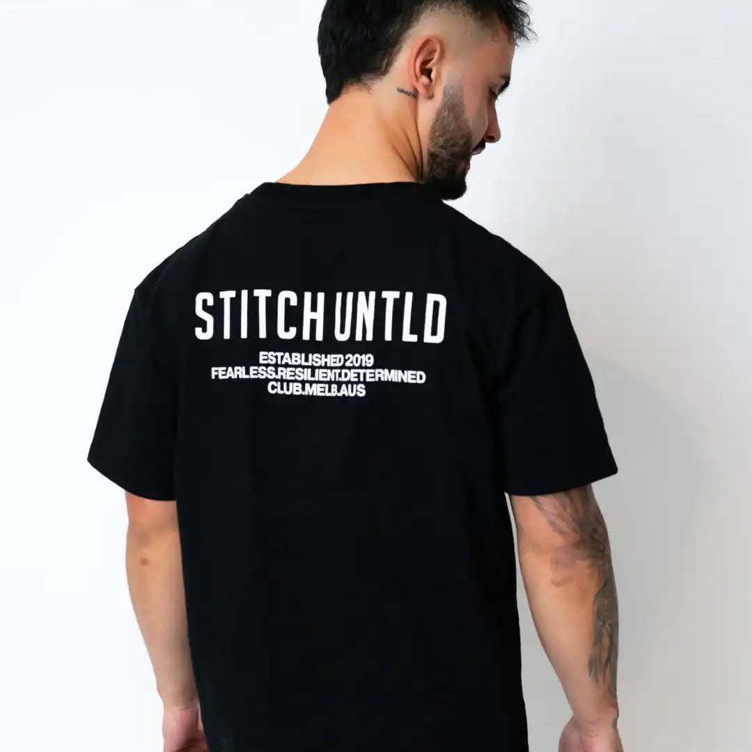 Person wearing stitch untitled club tee