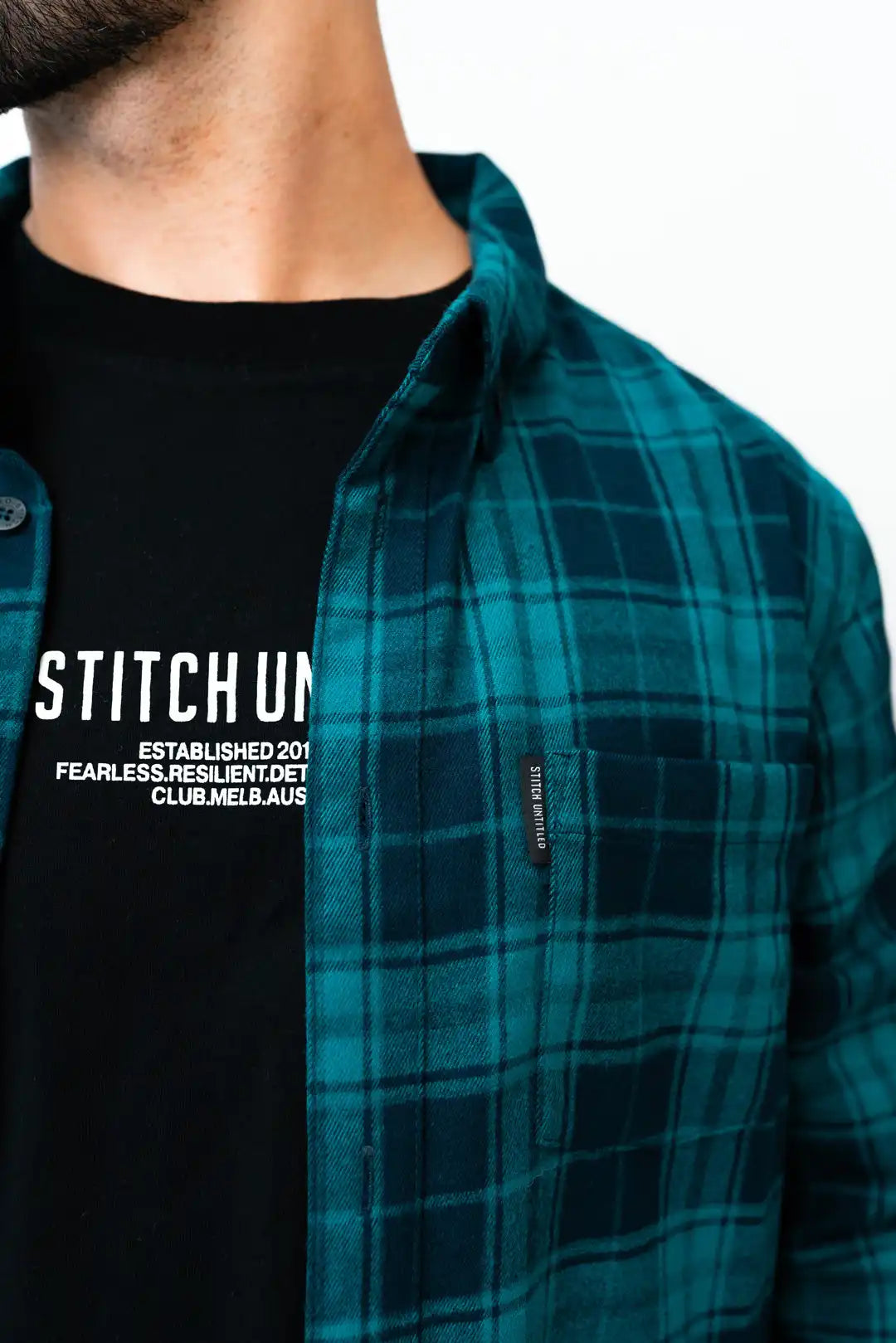 model wearing unisex stitch untitled crossroads flannel shirt