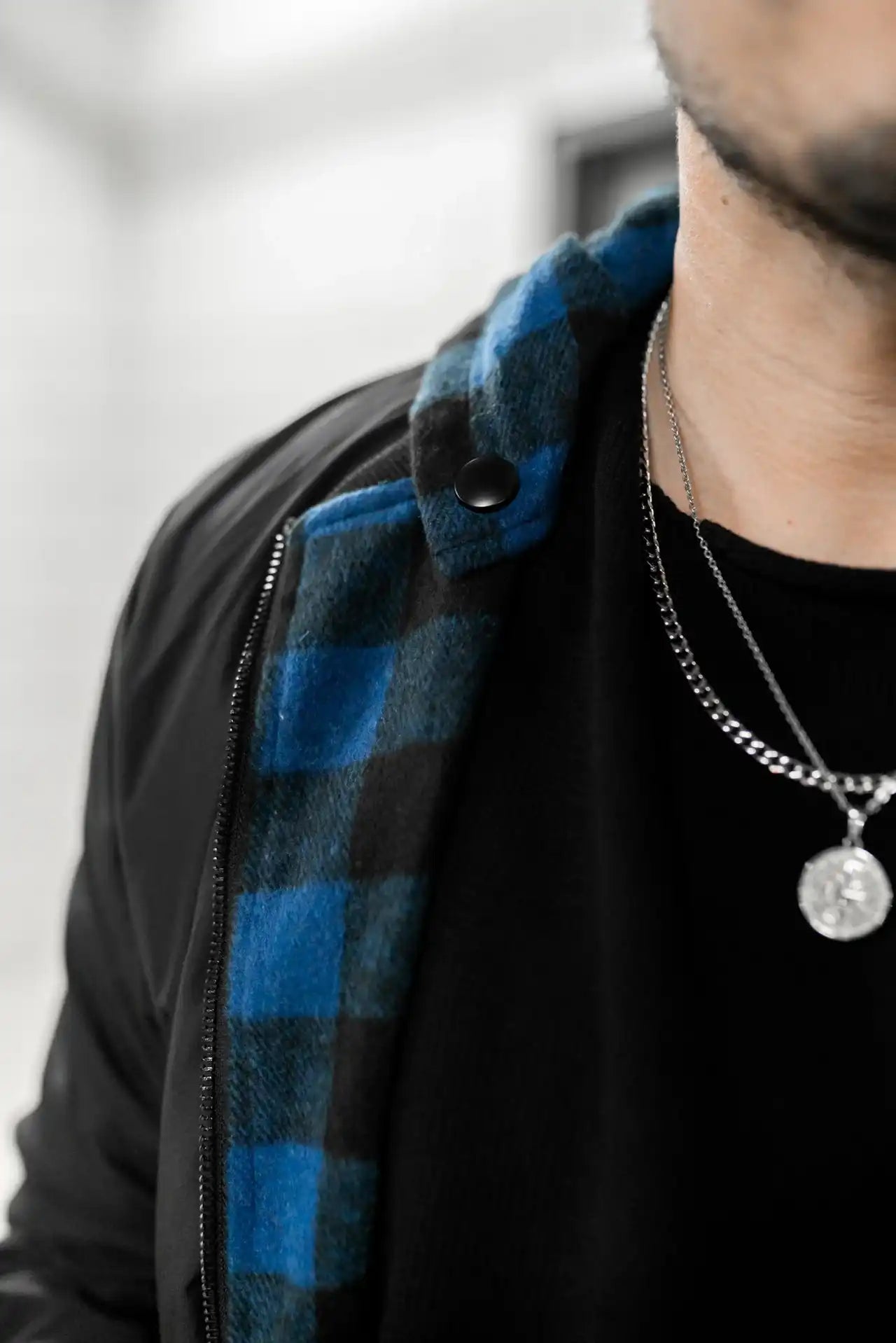 People standing in Melbourne garage wearing stitch untitled featherweight jacket