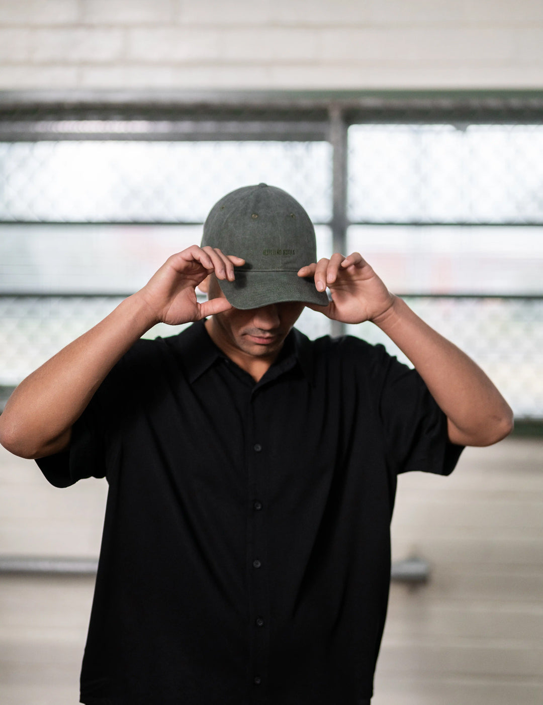 man wearing stitch untitled unisex clothing invert cap in khaki