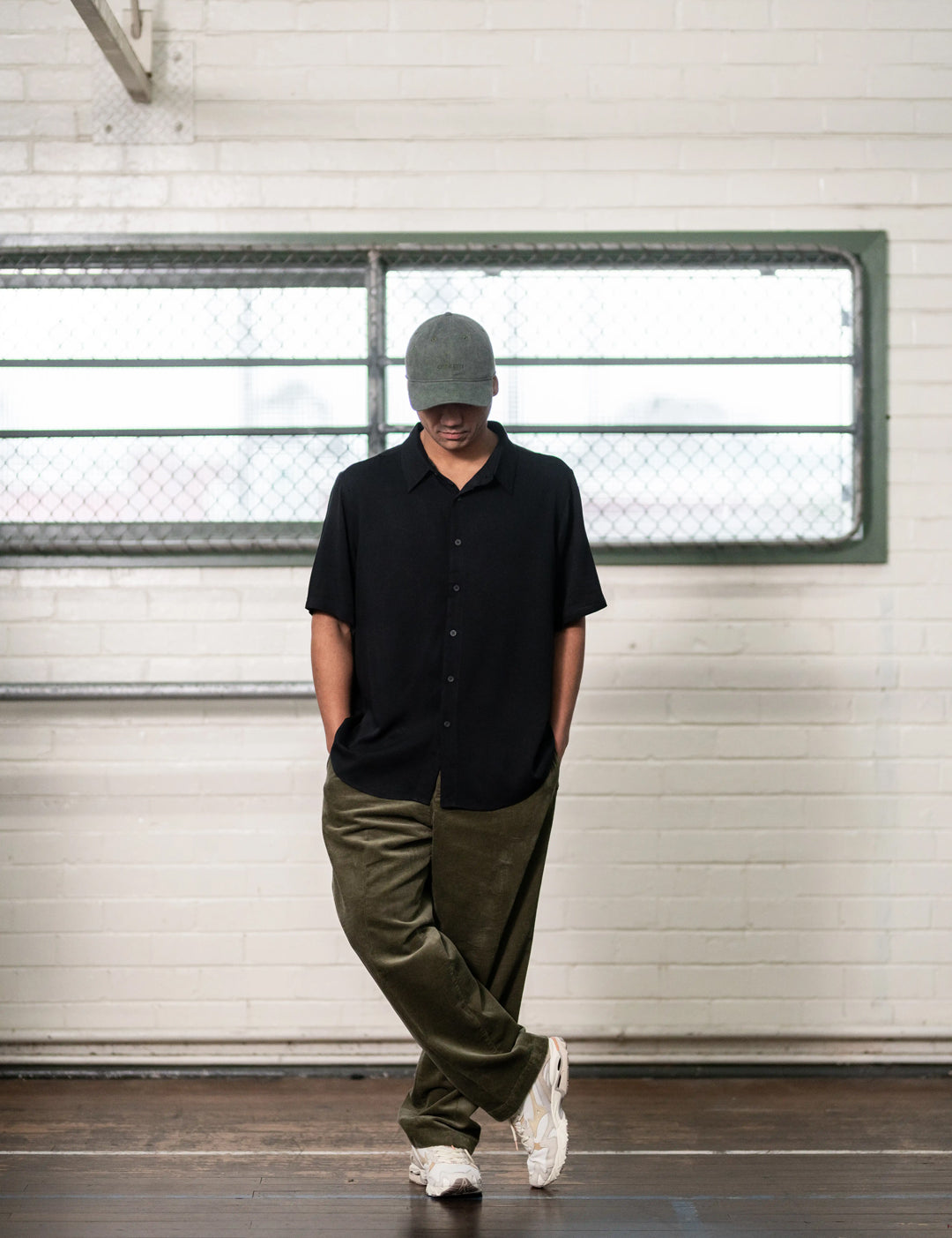 man wearing stitch untitled unisex clothing invert cap in khaki