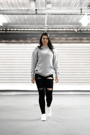 People standing in Melbourne garage wearing stitch untitled grey v1 knit